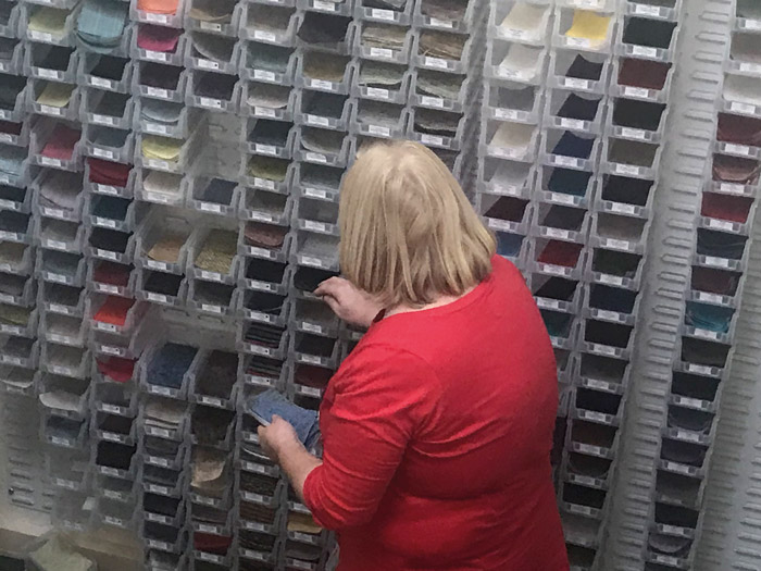 Debbie, our dedicated samples lady, selecting fabric sample options for a customer