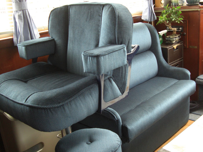 Cockpit seat and seating area upholstery for a leisure boat